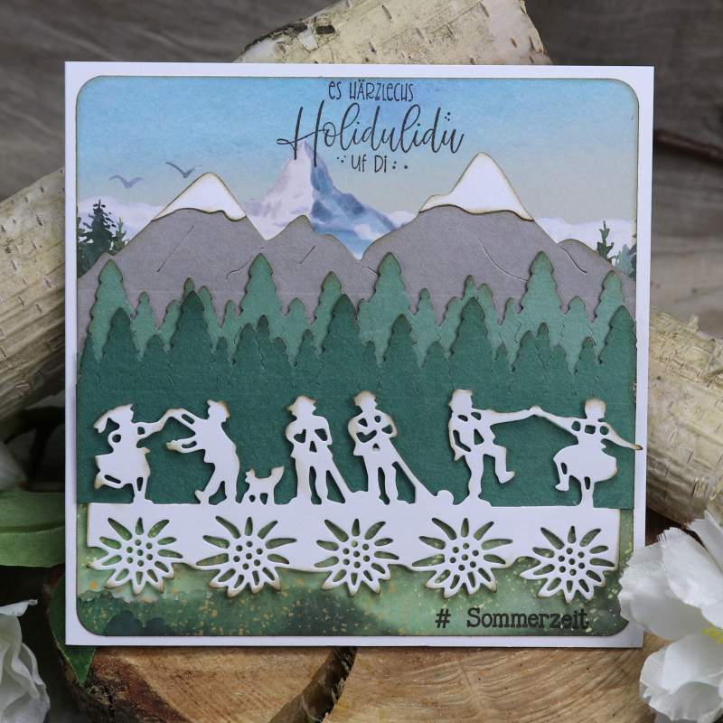 Holzstempel es härzlechs Holidulidu uf di