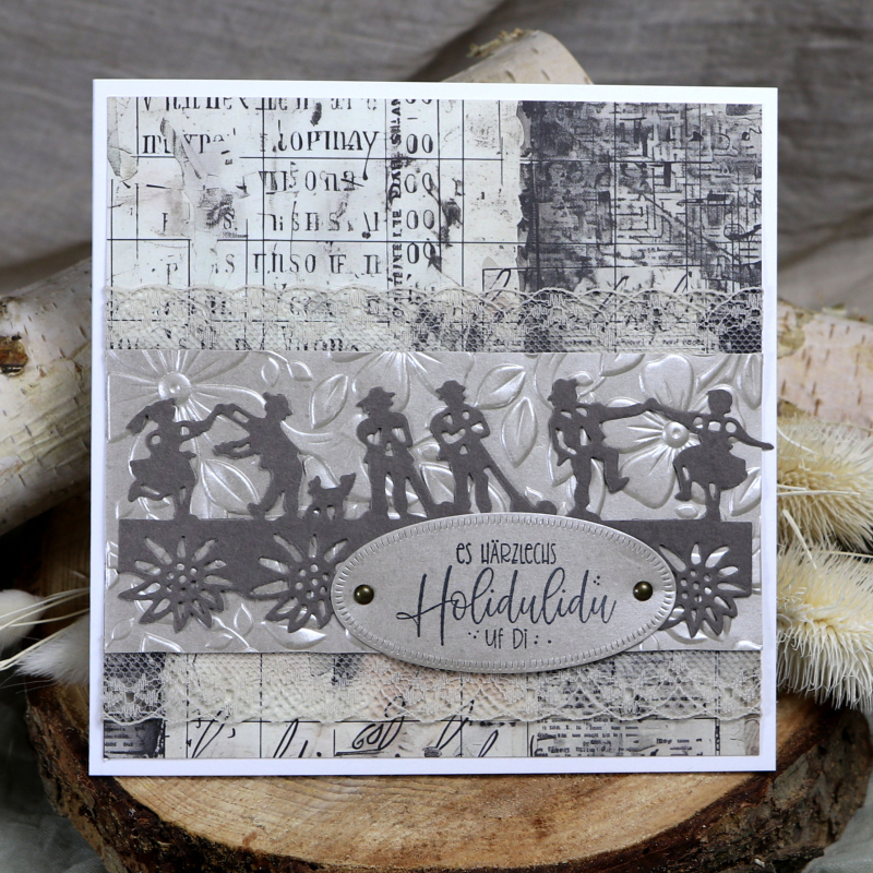 Holzstempel es härzlechs Holidulidu uf di