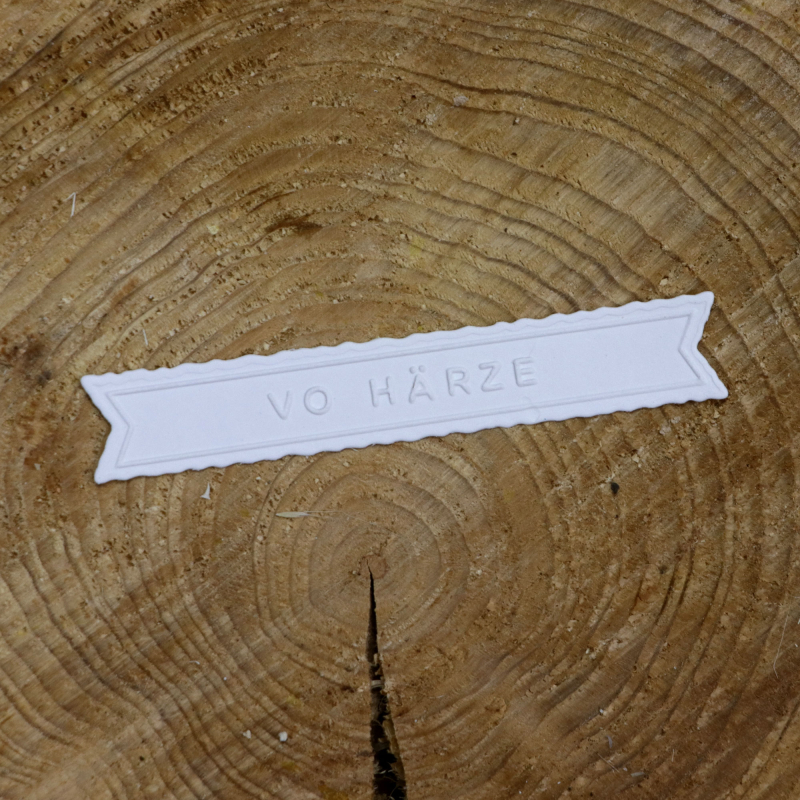 Kombinierte Stanz- und Prägeschablone vo Härze